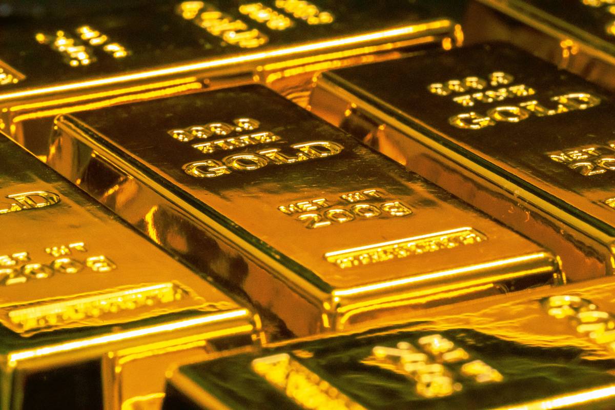 Investor analyzing gold and precious metals fund performance versus scrap gold resale value
